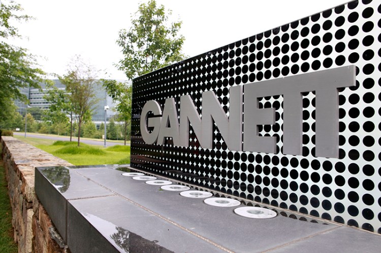 In this file photo, the sign for Gannett headquarters is displayed in McLean, Va. Gannett Co. The Associated Press