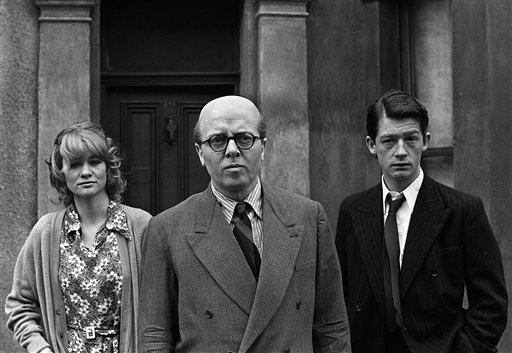 Richard Attenborough, center, portraying mass murderer John Reginald Christie in the lead role of "10 Rillington Place," stands alongside John Hurt, right, and Judy Geeson in London in 1970. The Associated Press