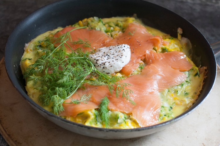 Open-faced corn and zucchini omelet with smoked salmon