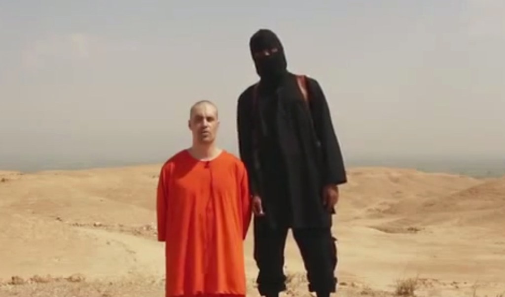 This is a frame from a video released by Islamic State militants Tuesday that purports to show the killing of freelance journalist James Foley from Rochester, N.H.