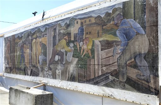 A large mural displayed at the Skagit County Fair in Mount Vernon, Wash., is an original 1941 painting by William Cumming. The Associated Press