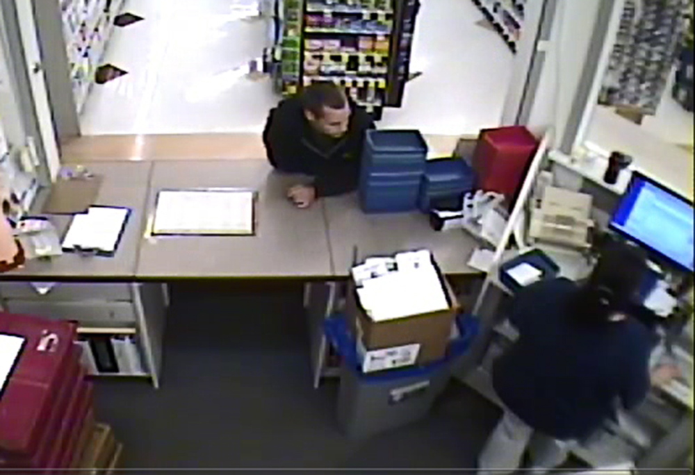Surveillance footage from the Rite Aid at the corner of Bridge and Spring streets in Gardiner shows a man, leaning on the counter, who is wanted for stealing drugs Thursday.