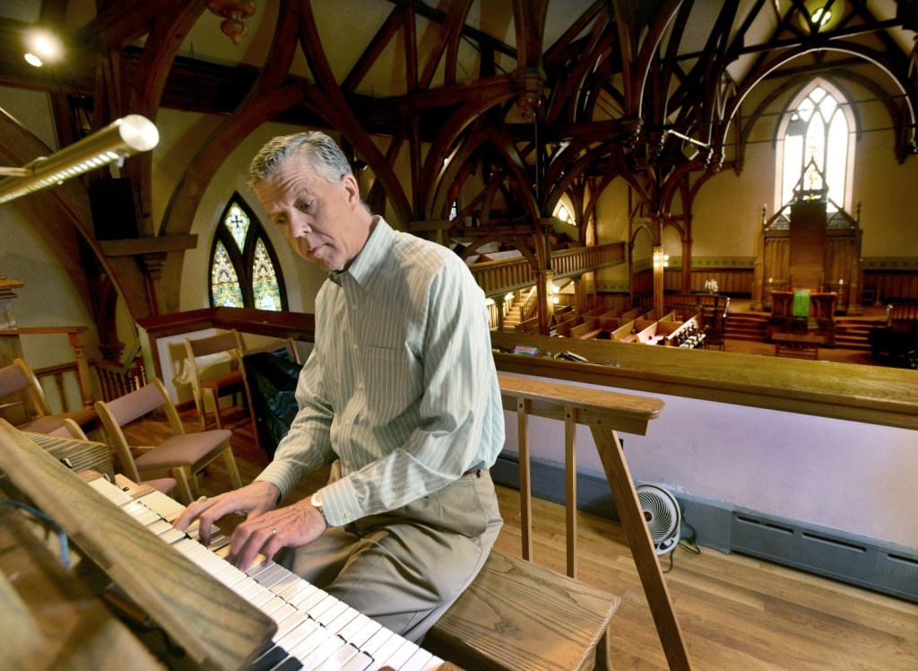 Ray Cornils, Portland's municipal organist, is also the minister of music at First Parish Church in Brunswick, where's he's seen playing in 2014.