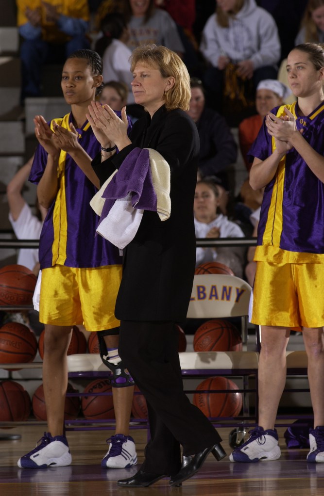 Mari Warner, right, will be inducted into the University of Albany Hall of Fame for her 20 years coaching the women’s basketball team. She now coaches the Falmouth High girls. Courtesy University of Albany 