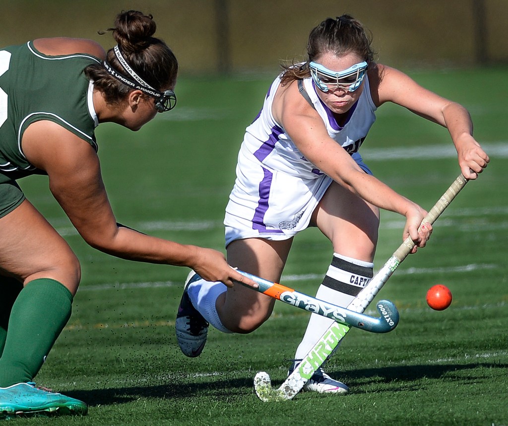 Deering’s Kerry Wells battles for control of the ball with Bonny Eagle’s Marissa Jeffords during their game Monday in Portland. The Rams scored four times in the second half to pick up a 4-0 victory. Shawn Patrick Ouellette/Staff Photographer