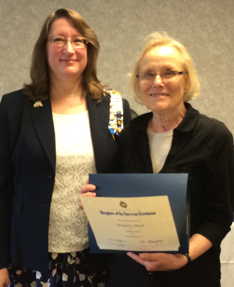 Margaret Leblond, right, was recognized for 40 years of membership in the Rebecca Emery Chapter of the Daughters of the American Revolution in Biddeford. Leblond joined the Elizabeth Harrison Chapter of the DAR in Missouri and transferred to the Rebecca Emery Chapter not long after. Rebecca Emery Chapter regent Valerie Owen, left, presented Leblond with her 40-year certificate during a recent ceremony.