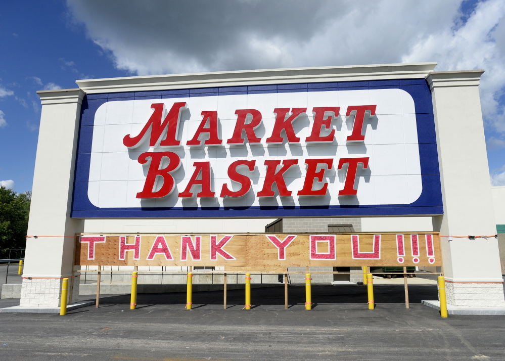 A large sign expressing gratitude is added under the Market Basket sign that can be seen from the Maine Turnpike in Biddeford. 