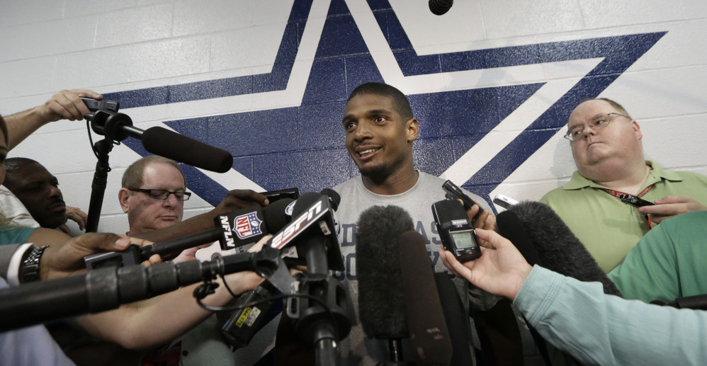 Michael Sam speaks to reporters after a team practice at the Cowboys’ headquarters Wednesday in Irving, Texas. Sam was added to Dallas’ practice squad.