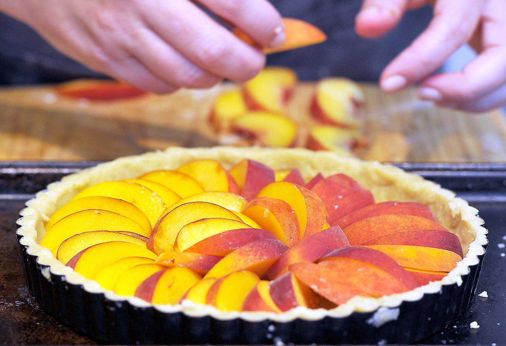 Making a tart with non-local peaches is a fallback, as Maine growers report the state’s peach crop is down 50 percent to 80 percent from last year.