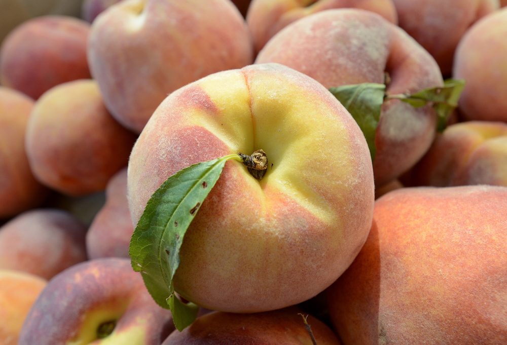 Despite the disappointing season, there are some Maine-grown peaches around. These, from Pulsifer’s Farm in Cornish, were at the Monument Square Farmer’s Market on Wednesday.