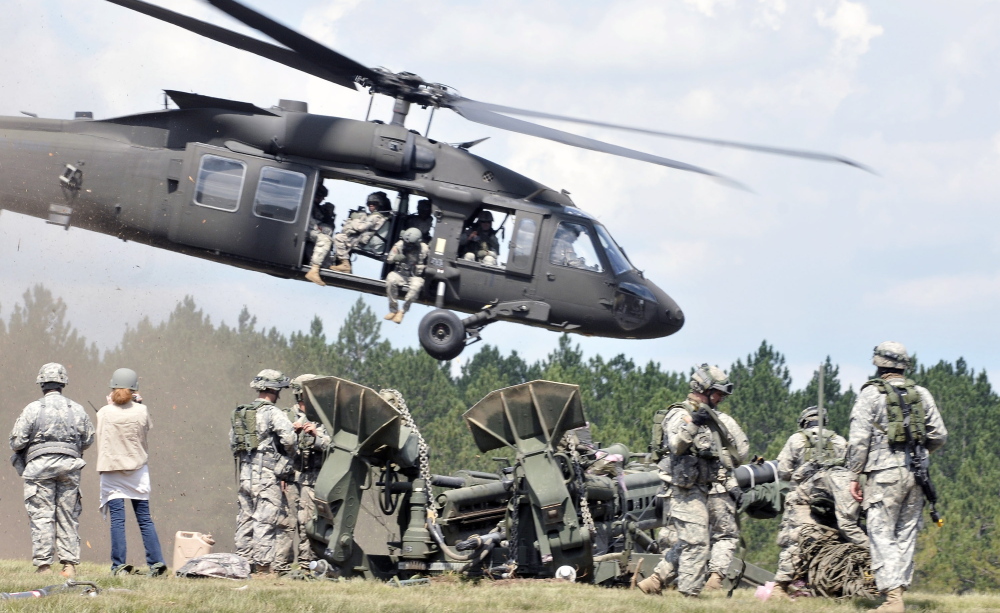 Army National Guard members take part in an exercise July 19 at the Camp Grayling Joint Maneuver Training Center in Grayling, Mich.