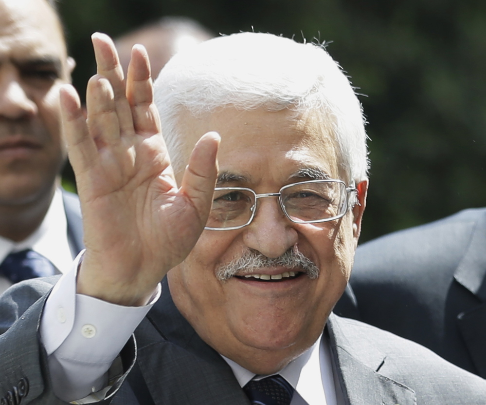 Palestinian President Mahmoud Abbas arrives in Cairo, Egypt, on Sunday. He wants Hamas to yield power in the Gaza Strip.