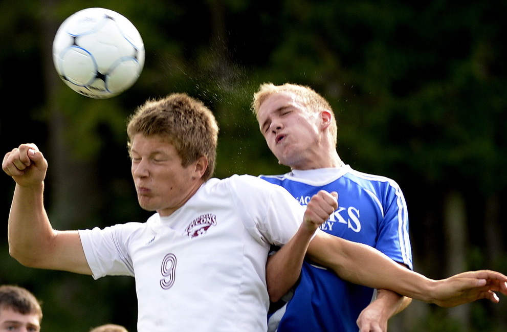 Freeport’s Jack Davenport, left, and Sacopee Valley’s Dominic Locke compete for the ball in Tuesday’s boys’ soccer game at Freeport. The teams played to a 0-0 tie. Both teams are 0-1-1.