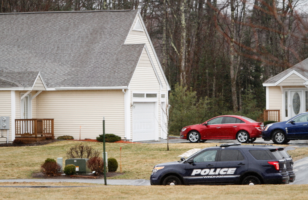 Police vehicles are parked in April outside 2 Searsport Way in Windham, where Cumberland County Sheriff’s Deputy Nicholas Mangino shot and killed 66 year-old Stephen McKenney in his driveway when McKenney refused to drop a handgun and walked toward Mangino.