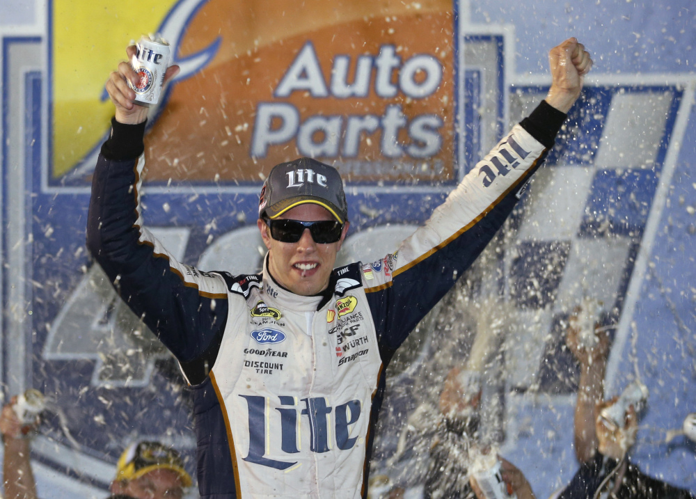 Brad Keselowski celebrates after winning the NASCAR Sprint Cup auto race at Richmond International Raceway in Richmond, Va., Saturday.