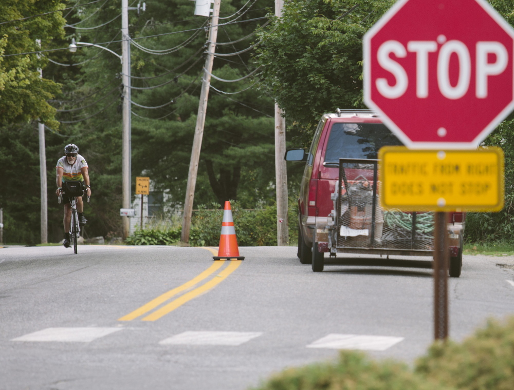 California’s Brian Olmsted rides into Newcastle last week where road construction forced cyclists to detour onto a road that might have made the already scenic trek all the more memorable for them.