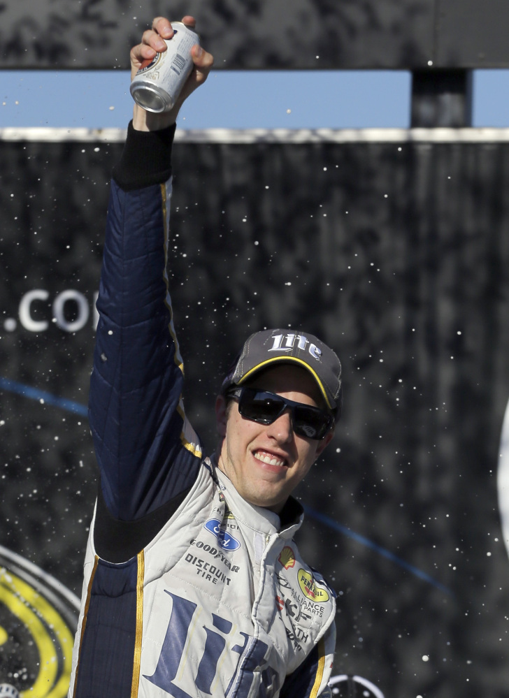 Brad Keselowski celebrates Sunday after winning the Sprint Cup race at Chicagoland Speedway – his series-high fifth victory of the season.