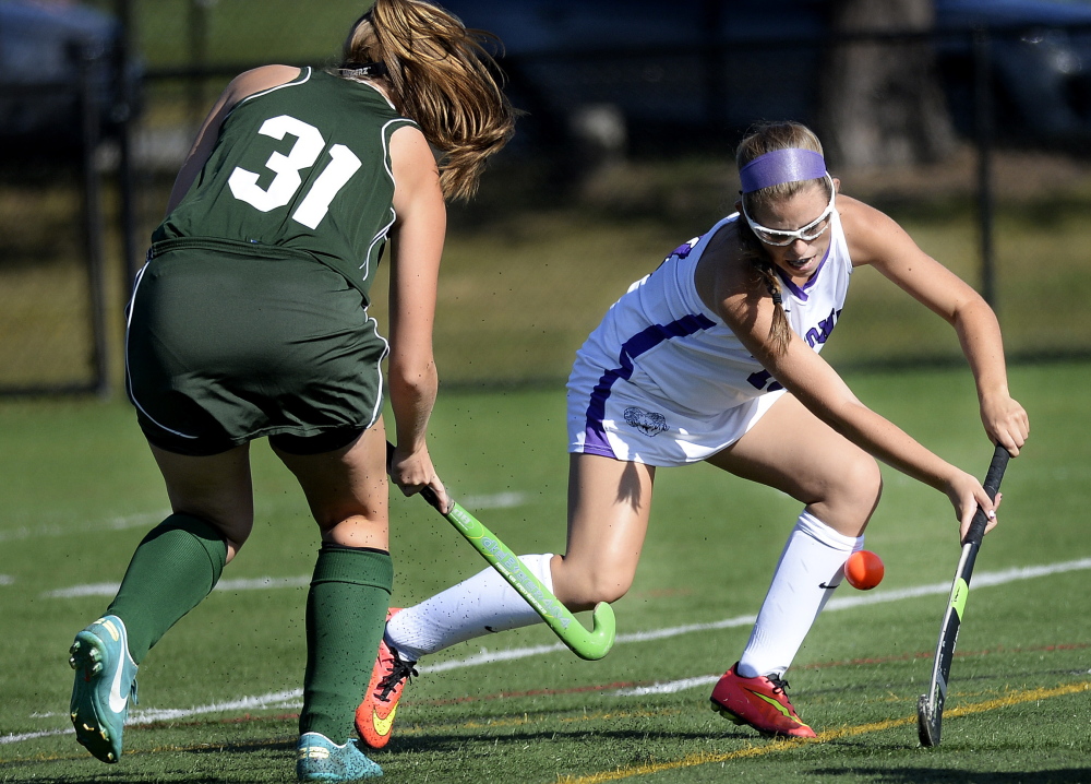 Deering’s Kaytlin DiBiase looks to settle the ball as Bonny Eagle’s Megan McIntosh moves in on defense during the Rams’ 4-0 win Monday at Portland. DiBiase scored two goals for Deering, which improved to 2-2 on the season.