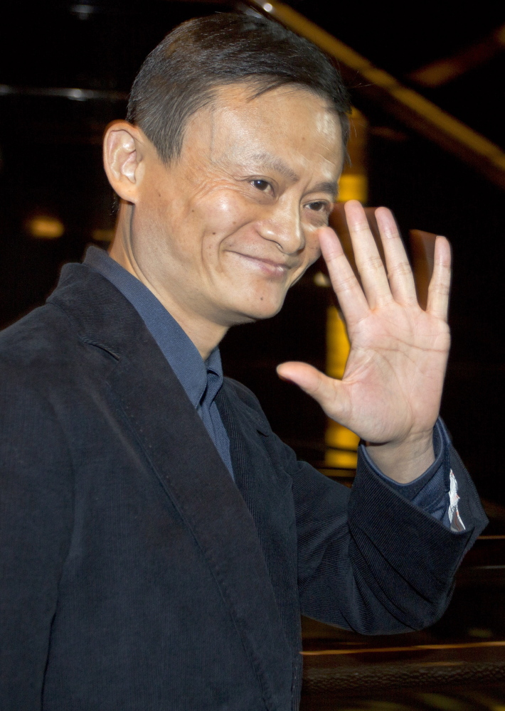 Alibaba Group CEO Jack Ma waves to reporters at a hotel in Hong Kong on Monday. He and a few insiders have outsize power to nominate a majority of company directors. “It’s the biggest jeopardy, to put all that control in one man’s hands,” one investor says.