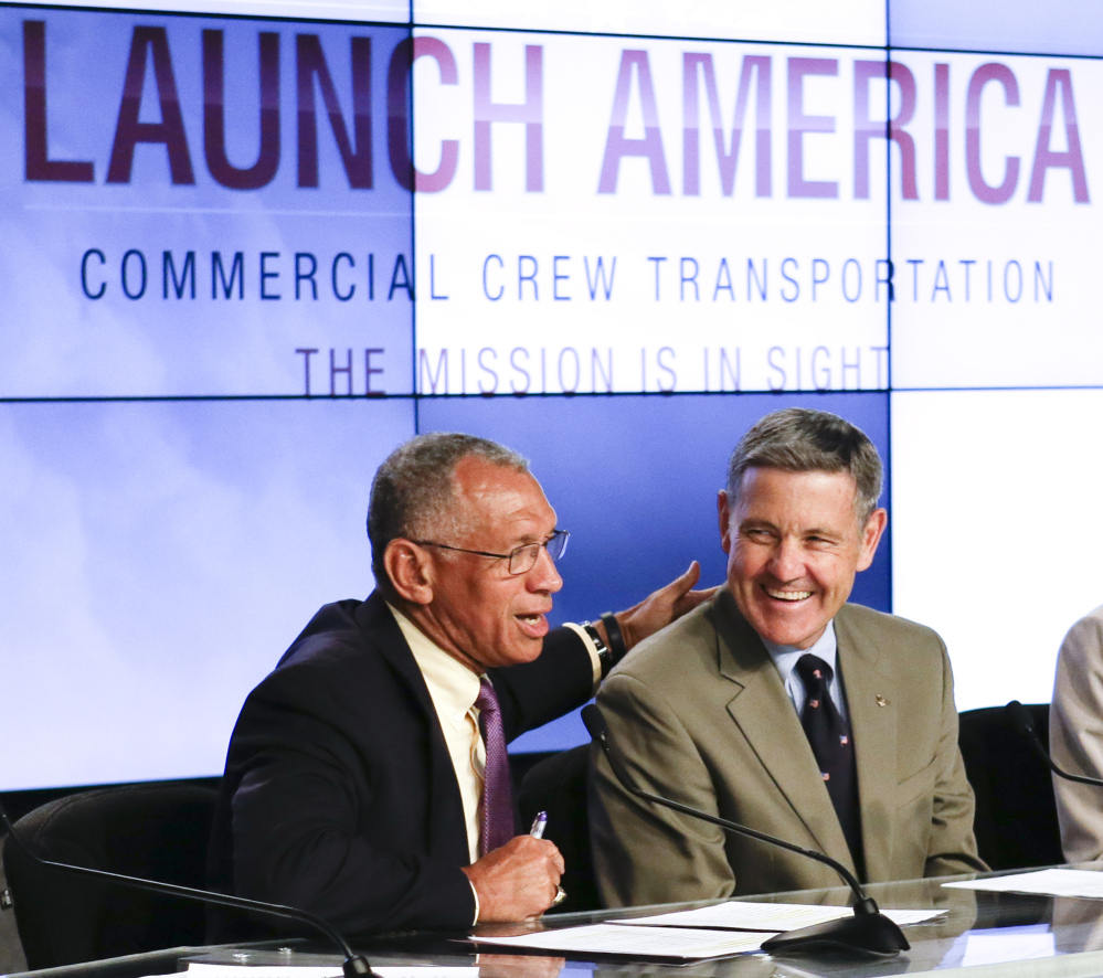 NASA Administrator Charles Bolden, left, and Kennedy Space Center Director Bob Cabana share a laugh Tuesday at Kennedy Space Center in Cape Canaveral, Fla. NASA has set a goal of 2017 for the first launch from Cape Canaveral.