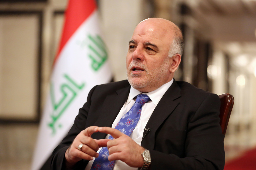 Iraq’s Prime Minister Haider al-Abadi speaks during an interview with The Associated Press in Baghdad, Iraq, Wednesday.