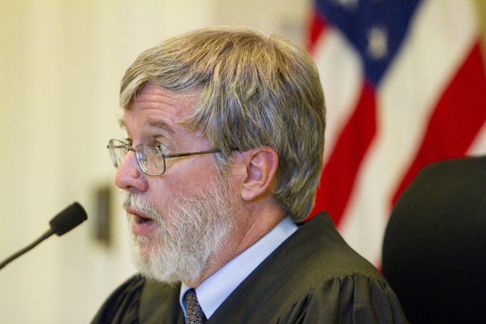 Justice Paul Fritzsche speaks during a hearing Friday in York County Superior Court on a complaint filed by a group pushing for a marijuana legalization referendum in York. The Board of Selectmen have twice voted against putting the question on the ballot, saying it is not a lawful ordinance.