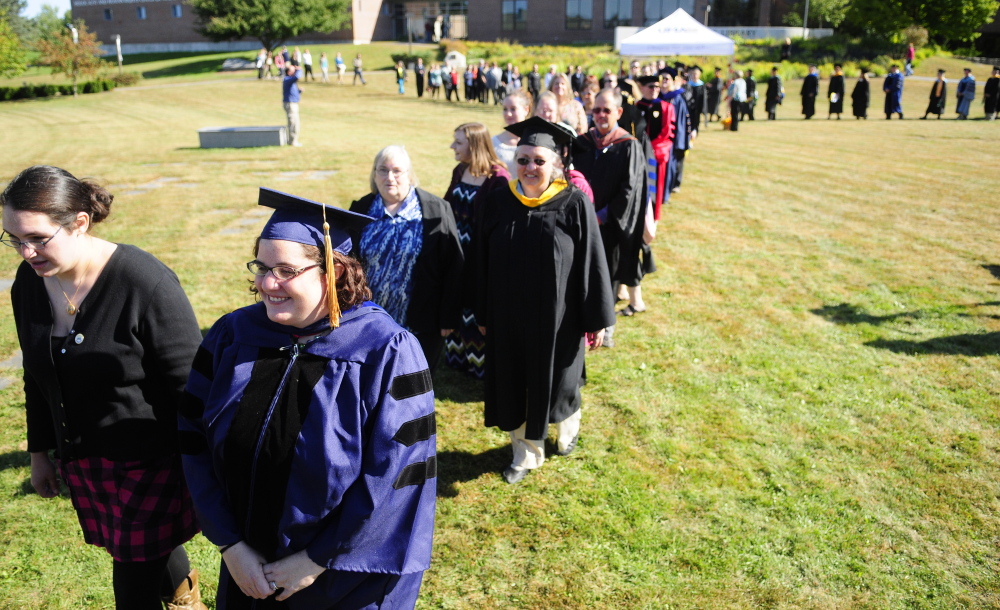 Rising Scholars and faculty members take part in the convocation in 2014 at the University of Maine at Augusta.