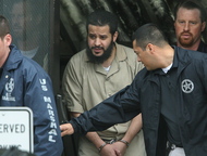 Mufid Elfgeeh leaves court in Rochester, N.Y., on Thursday, accused of plotting to kill members of the U.S. military.