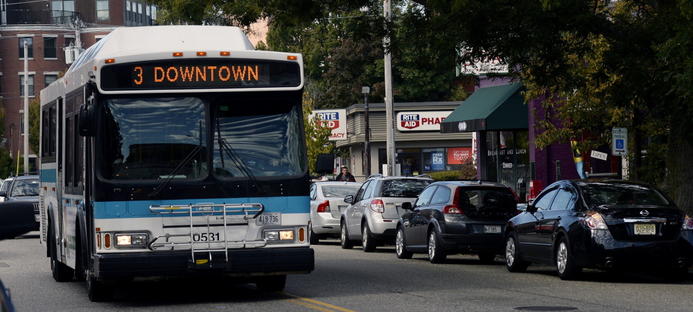 Use of Metro buses like this one on Congress Street in Portland could enable the expansion of the St. Lawrence Arts Center without requiring the creation of more parking on Munjoy Hill to accommodate theater patrons.