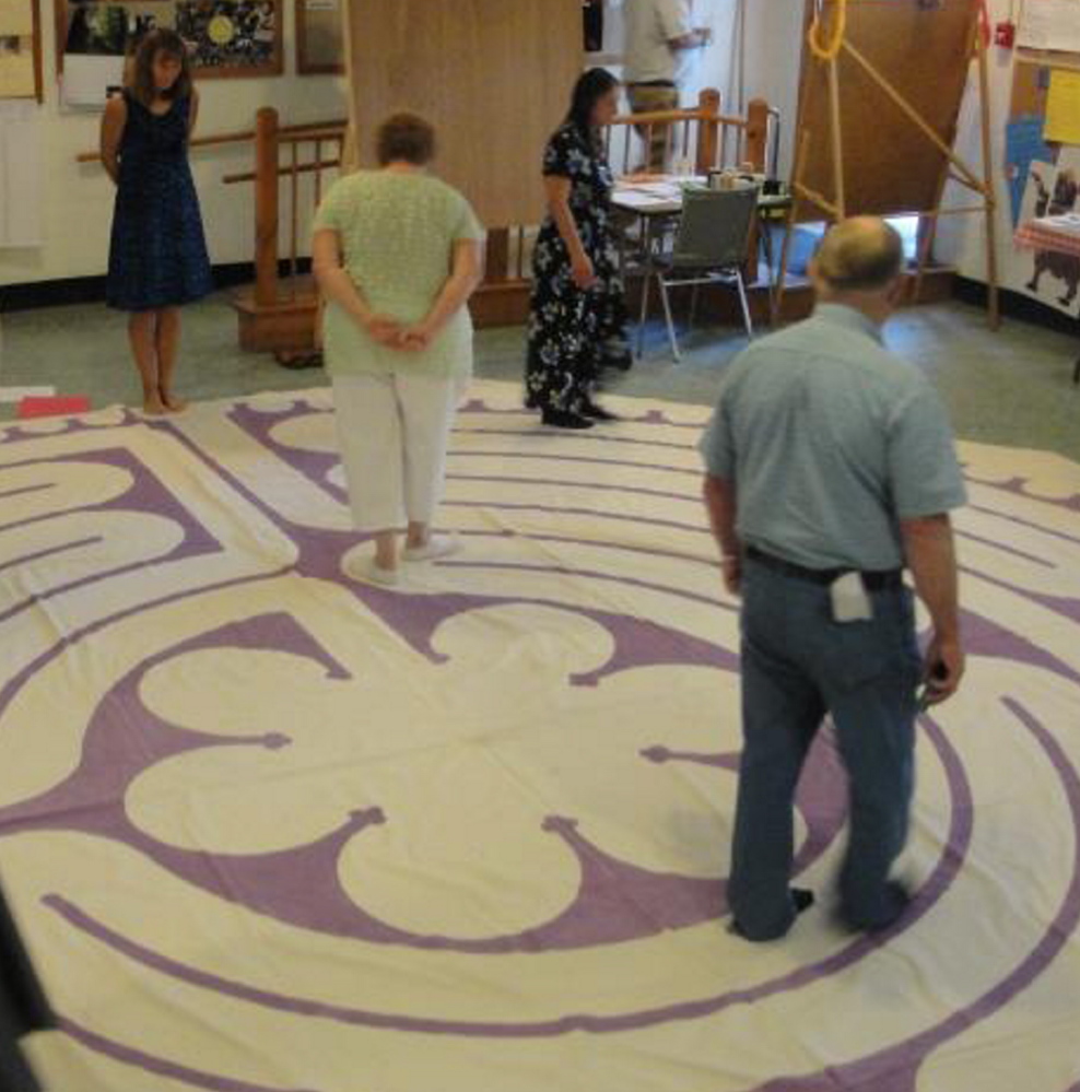 Raymond Village Community Church congregants participate in a meditative labyrinth walk, offered a few years ago.