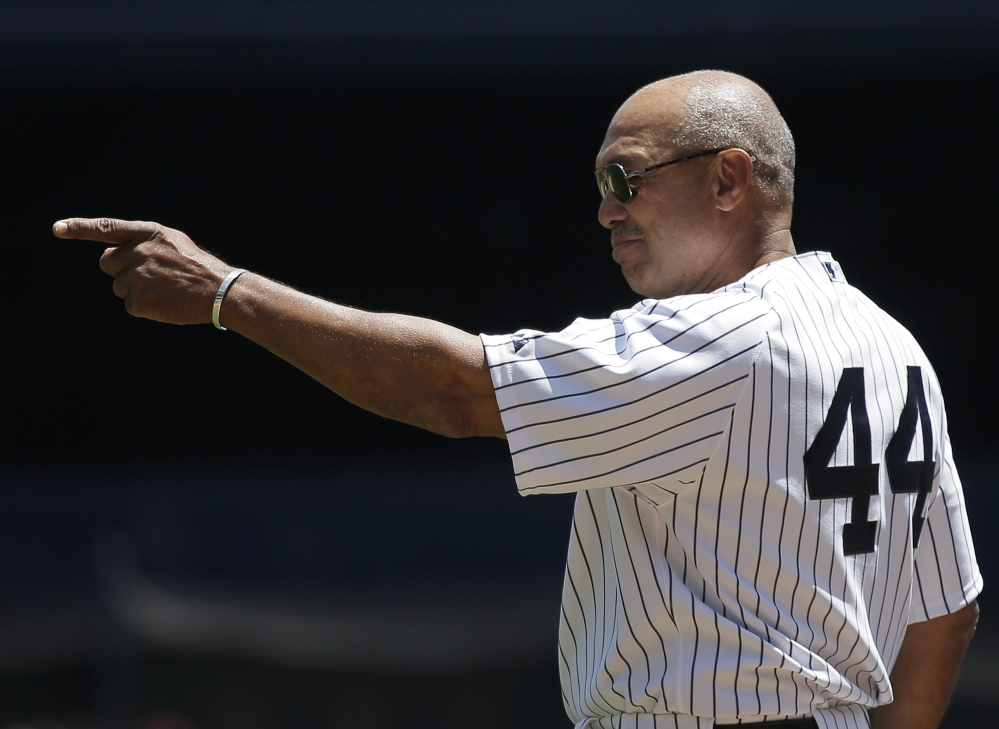 New York Yankees Hall of Famer Reggie Jackson takes part in Old-Timers Day ceremonies at Yankee Stadium in June 2013.