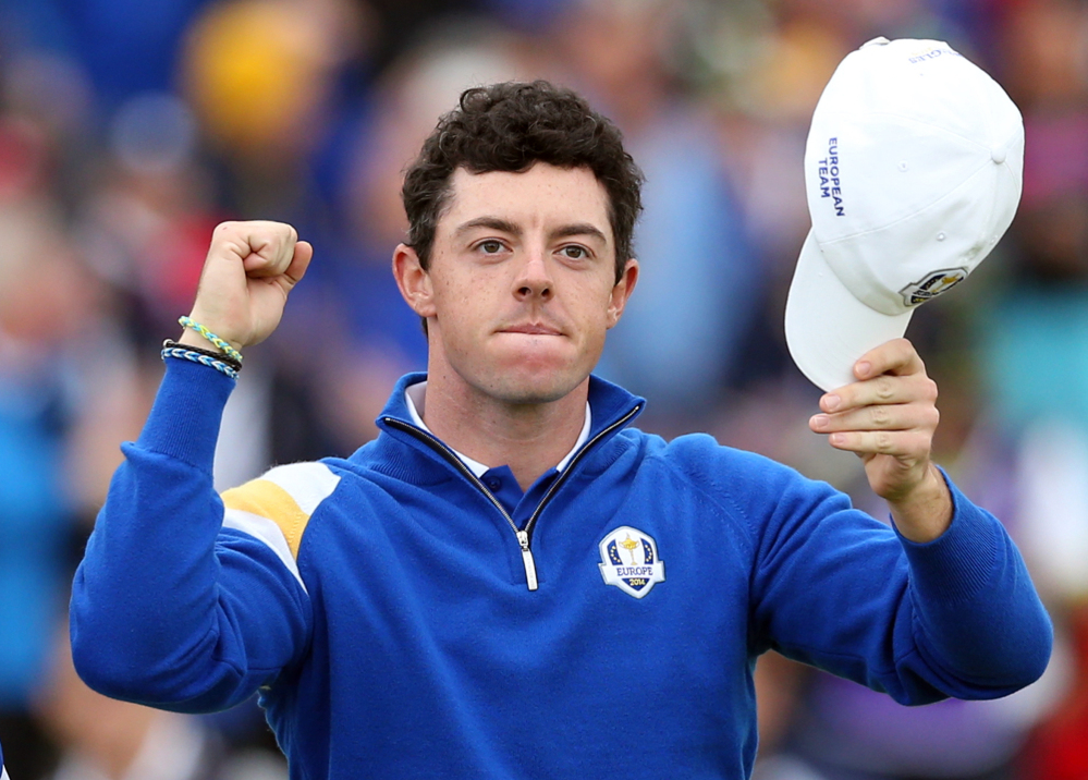 Europe’s Rory McIlroy celebrates winning his match against Rickie Fowler of the US on the 14th hole during the singles match on the final day of the Ryder Cup Sunday at Gleneagles, Scotland