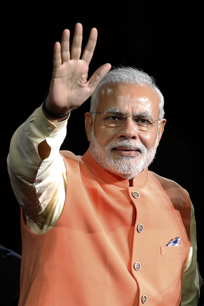 Prime Minister Narendra Modi of India waves as he is introduced before giving a speech at Madison Square Garden in New York on Sunday.