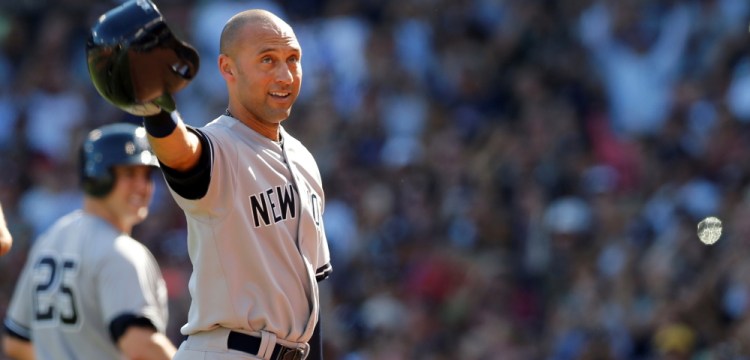 Derek Jeter acknowledges the crowd at Fenway Park as he leaves Sunday’s game for a pinch runner – ending a storied 20-year career with the Yankees.