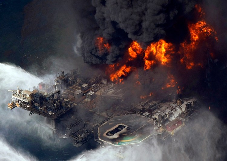 FILE - In this April 21, 2010 file aerial photo taken in the Gulf of Mexico more than 50 miles southeast of Venice on Louisiana's tip, the Deepwater Horizon oil rig is seen burning. The Associated Press