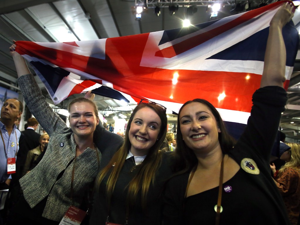 Campaigners celebrate as results come in at the Scottish independence referendum count at the Royal Highland Centre in Edinburgh, Scotland, Friday,  The Associated Press