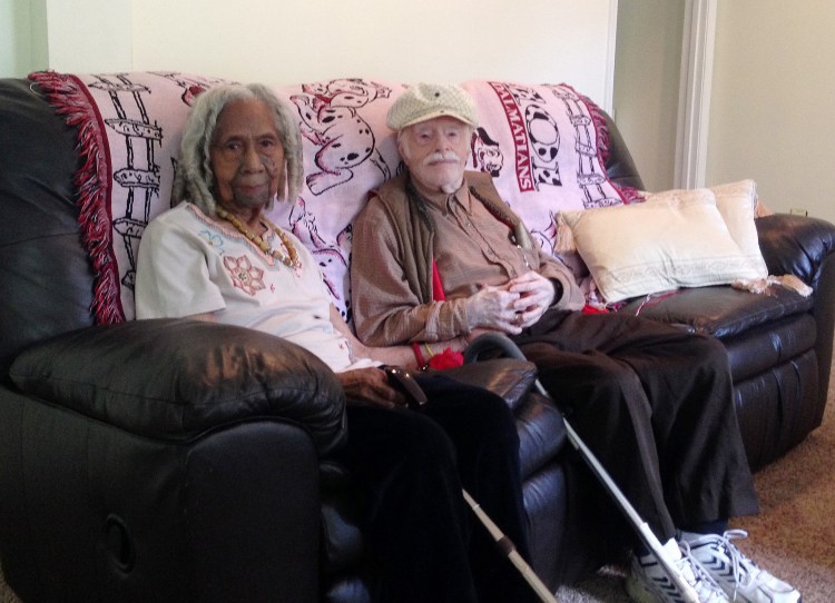 This Aug. 5, 2014, photo shows 96-year-old Edith Hill and 95-year-old Eddie Harrison in their home in Annandale, Va. The two had been companions for more than a decade before marrying earlier this year. The Associated Press