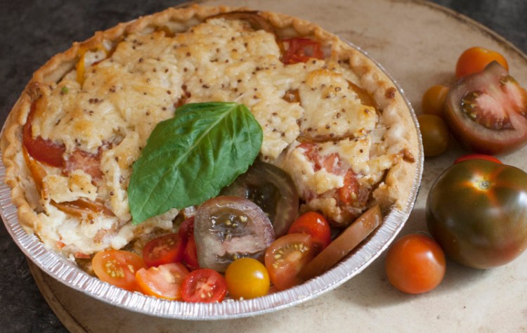Tomato Pie is a classic Southern dish made in summer when the tomato plants are heavy with ripe fruit.