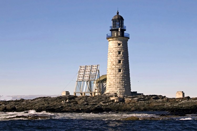 This undated photo released by the federal General Services Administration shows the Halfway Rock Light Station on a small island in Casco Bay off Harpswell. The administration is the nearing the end of an online auction for the 76-foot-high lighthouse, with a half dozen bidders and a high bid of more than $200,000.