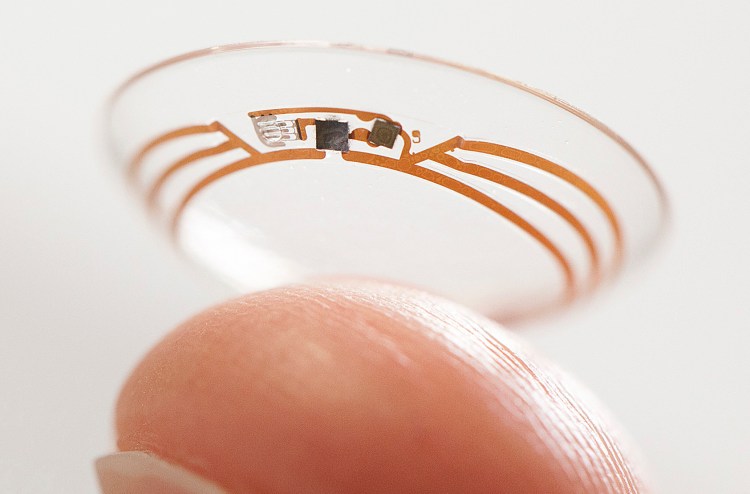 Google is testing a contact lens  to explore the properties of tears. The Associated Press / Google