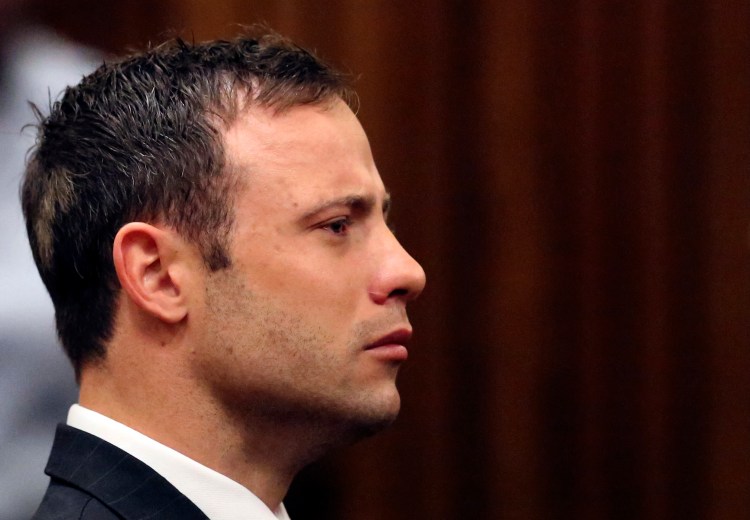 Oscar Pistorius looks straight ahead in court in Pretoria, South Africa, Friday as Judge Thokozile Masipa finds him guilty of culpable homicide for the shooting death of his girlfriend Reeva Steenkamp. The Associated Press