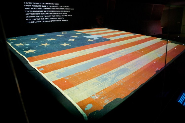 Smithsonian's National Museum of American History exhibit of the flag that inspired the national anthem 'Star-Spangled Banner.' The Associated Press