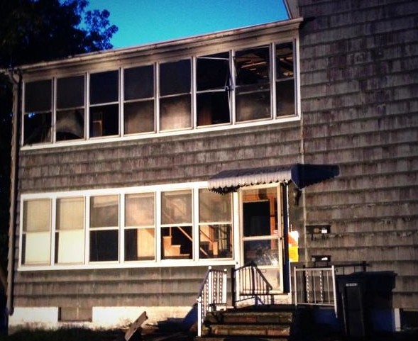 Fire damaged this apartment building at 5 Simard Ave. in Biddeford Sunday evening. WCSH photo.