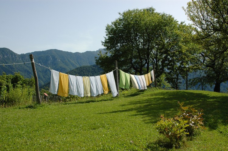 Drying laundry outside in the sun adds a fresh scent that comes from nature, not chemicals.