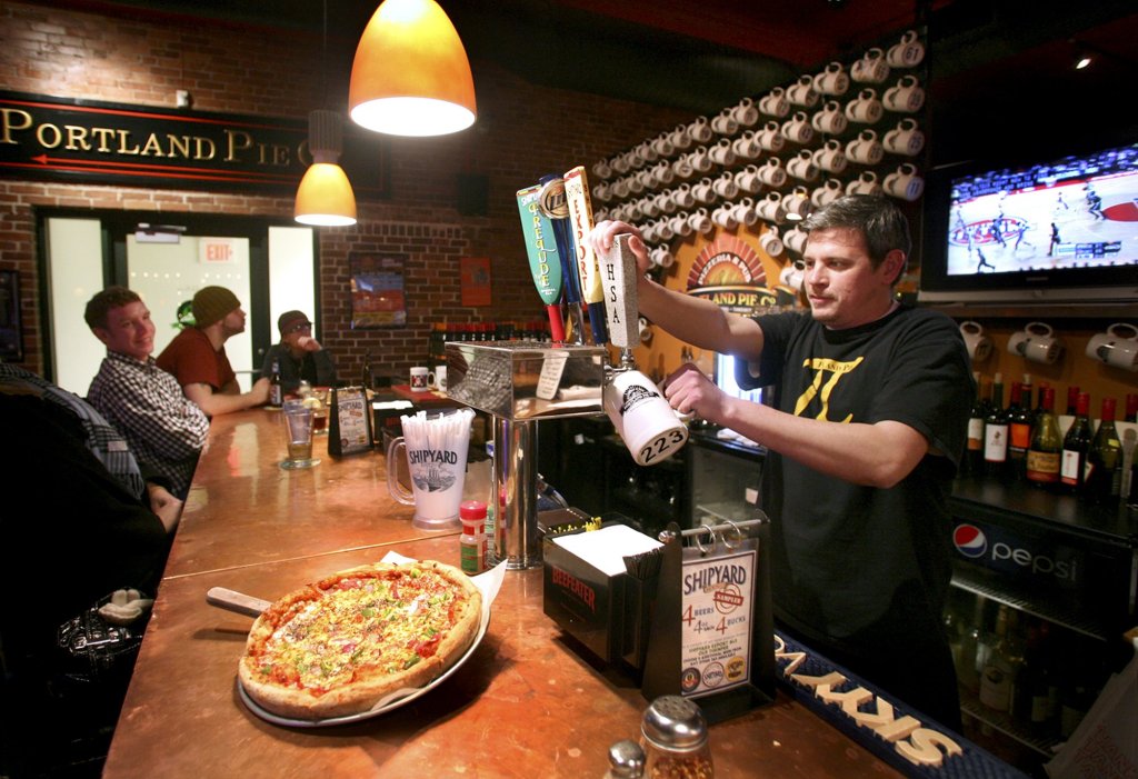 Bartender Sage Marble pours a beer at Portland Pie Co. in Westbrook.
Press Herald file photo 