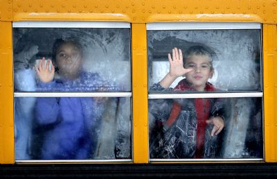 Gabe Souza's "Frosty window," a photograph of two children looking out a frost-covered bus window, won first place in the feature photo category of the Maine Press Association's annual contest.