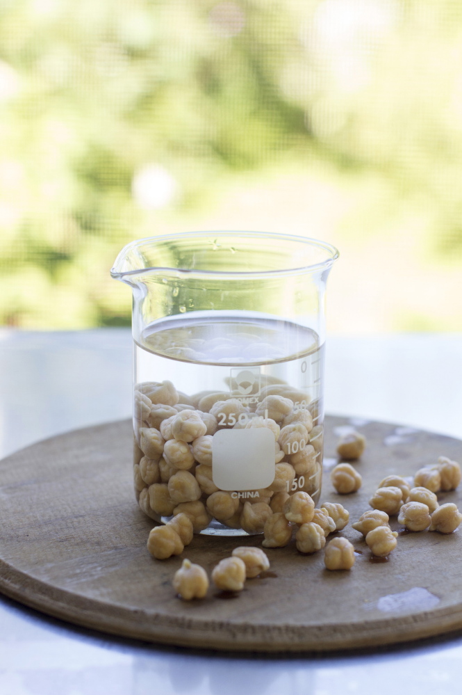 Soaking chickpeas or other beans overnight in salted water ensures a tender skin, a more evenly cooked bean and a shorter cooking time.