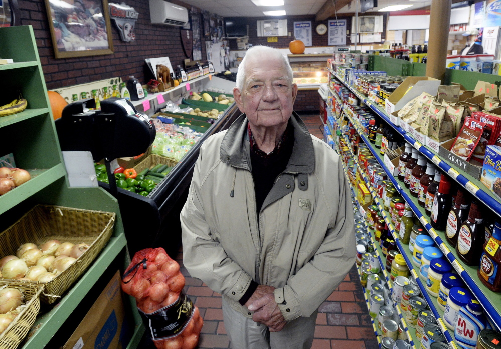 Moran’s Market owner Bernie Larsen, 85, works six days a week at his store on Forest Avenue in Portland’s Riverton neighborhood. He says the personal touch is important and he enjoys interacting with his customers.