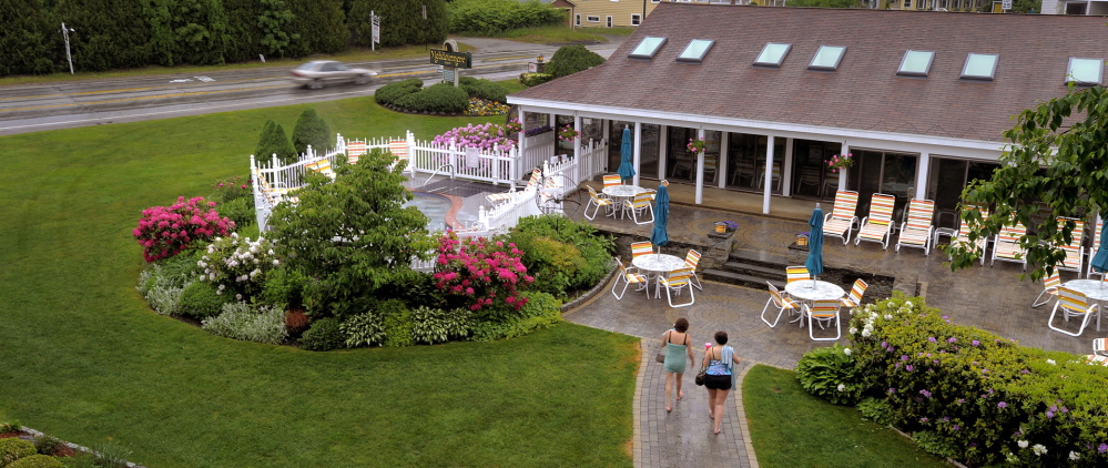 The gardens and pools at Meadowmere Resort in Ogunquit, seen early last summer, are environmentally friendly. Ogunquit is considering an ordinance that would ban chemical pesticides, fertilizers and herbicides.