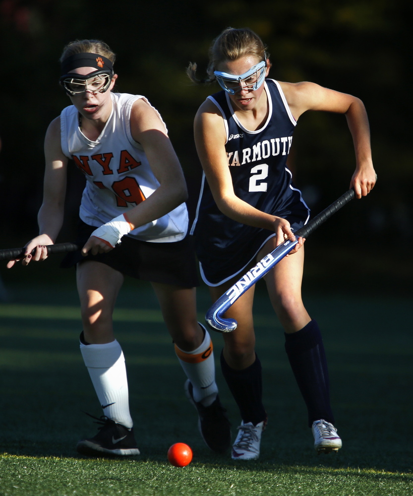 Georgia Giese of Yarmouth pushes the ball ahead while being chased by Marina Poole of North Yarmouth Academy. Poole’s goal in overtime enabled NYA to improve its record to 9-2, while Yarmouth dropped to 10-1.